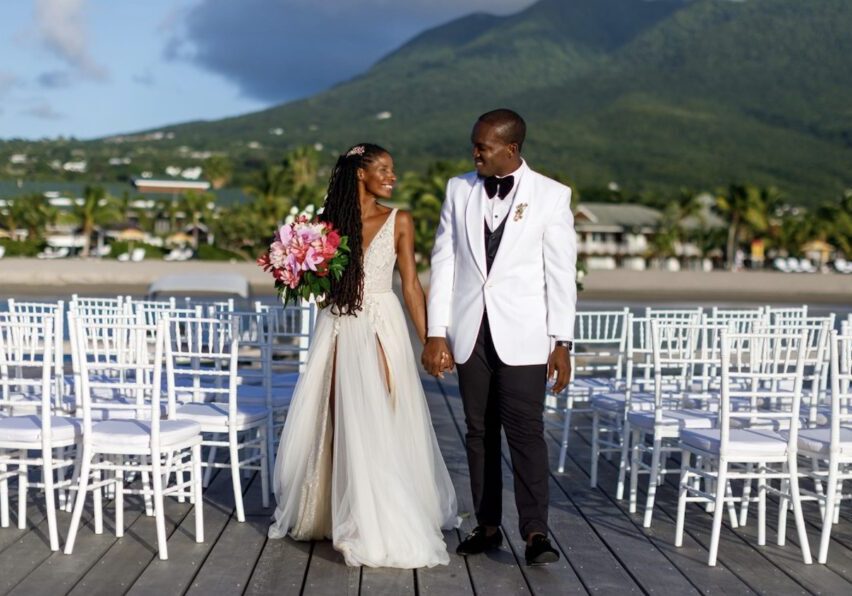 bride and groom walking down aisle of wedding deck
