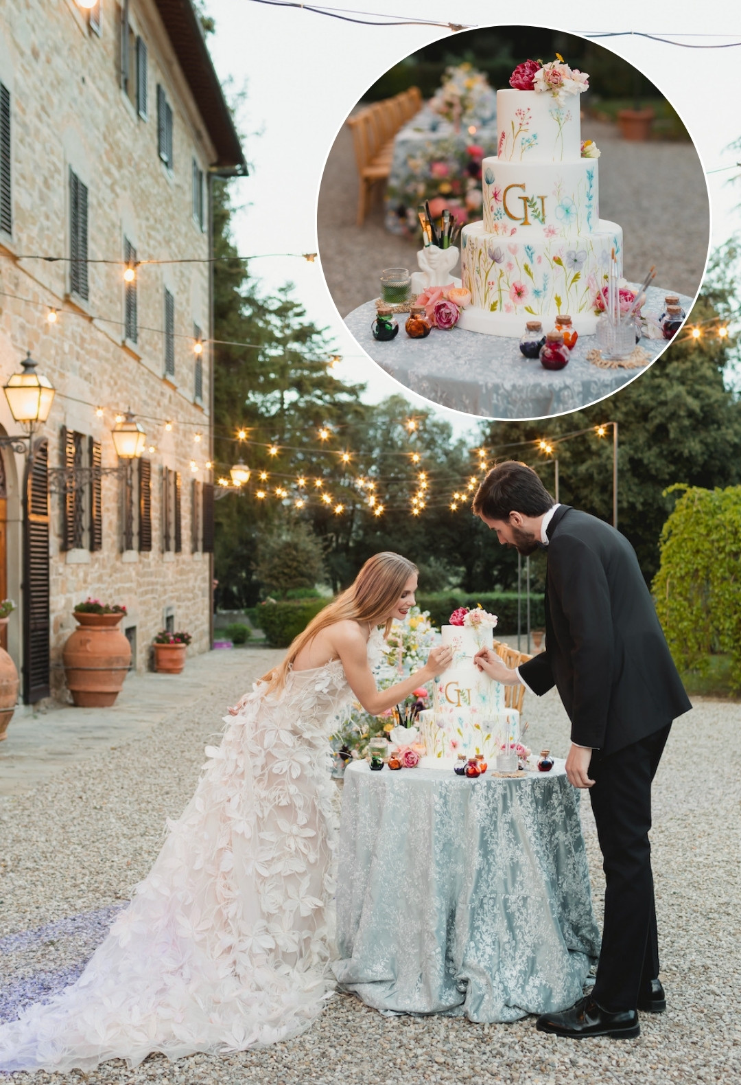 Bride and groom cut a floral-themed wedding cake on a table outside, with string lights and a rustic building in the background; cake detail shown in inset.